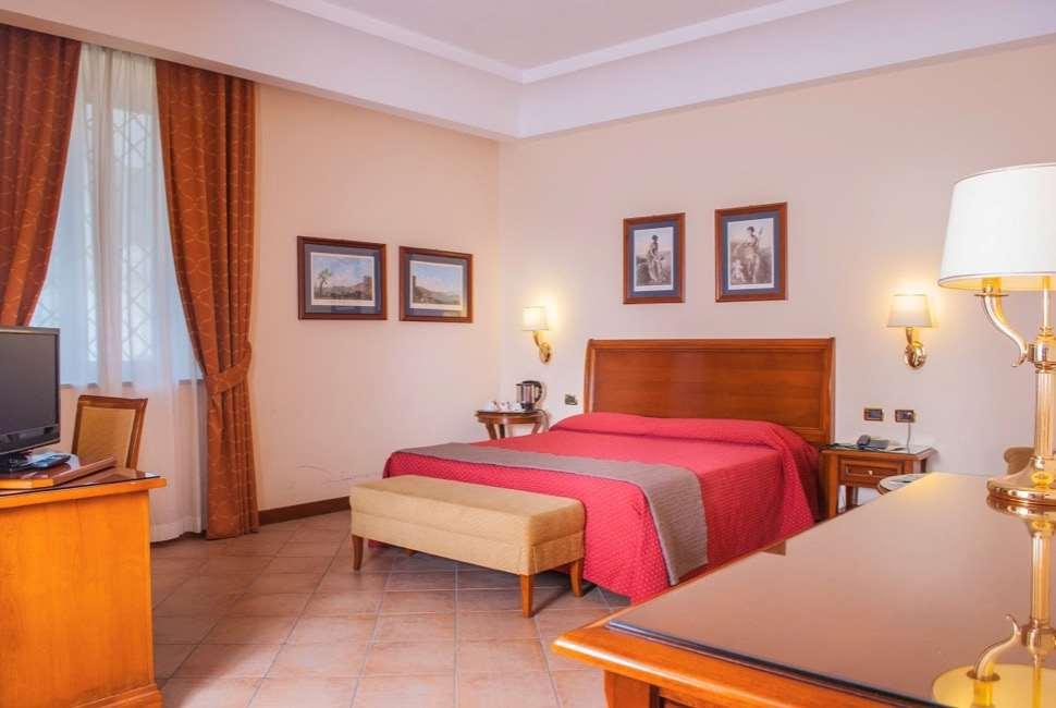 Le Cheminee Business Hotel Napoli Szoba fotó