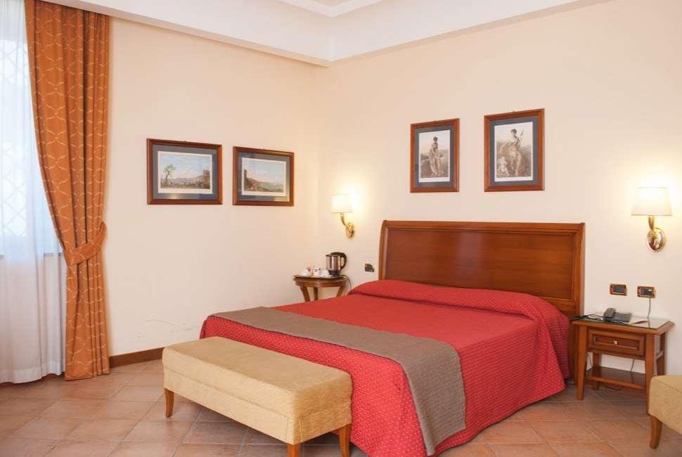 Le Cheminee Business Hotel Napoli Szoba fotó