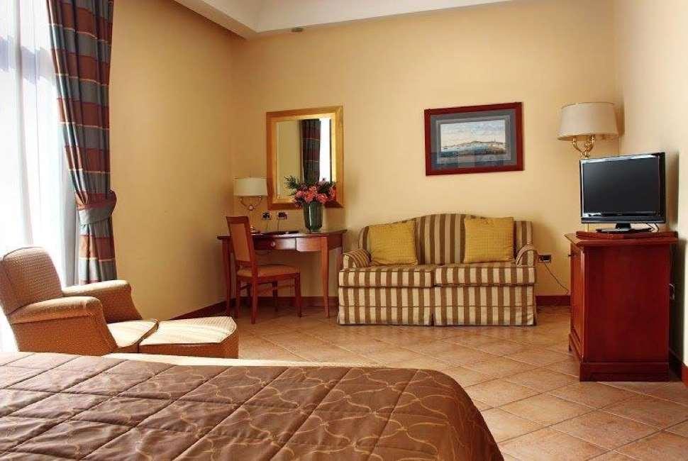 Le Cheminee Business Hotel Napoli Szoba fotó