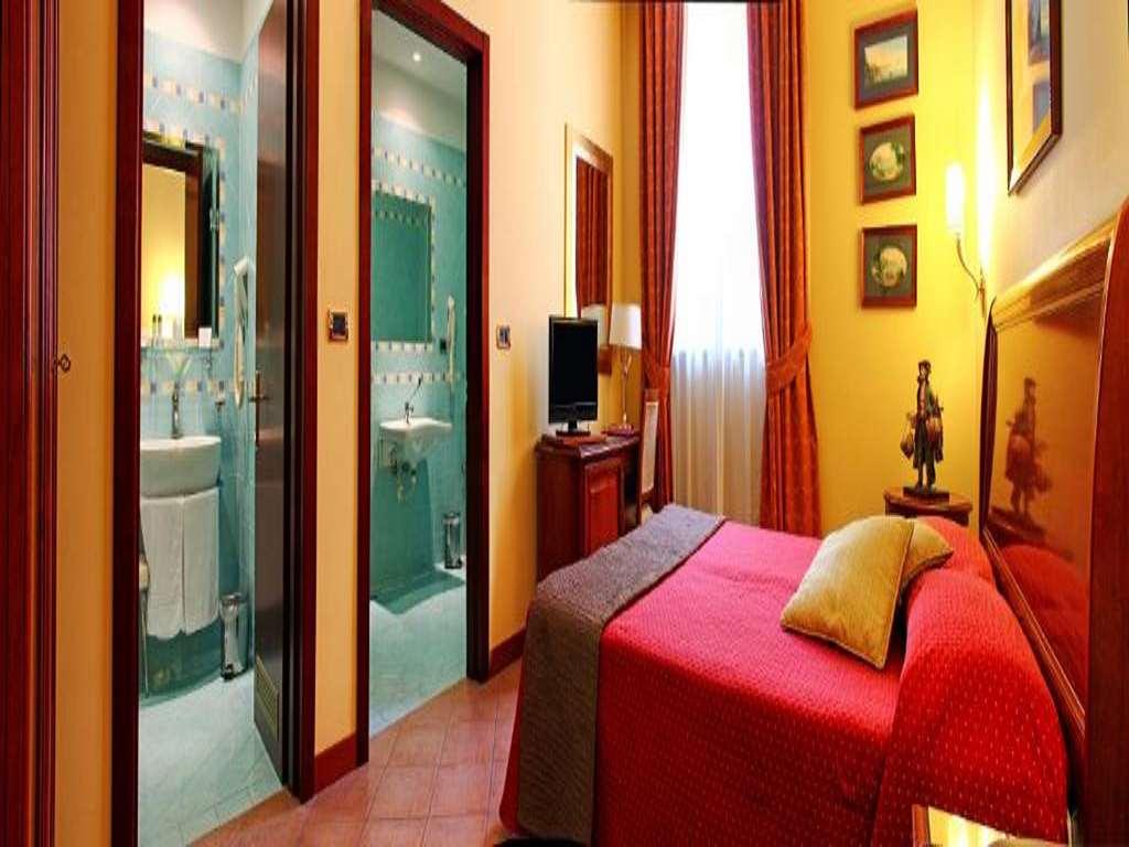 Le Cheminee Business Hotel Napoli Szoba fotó